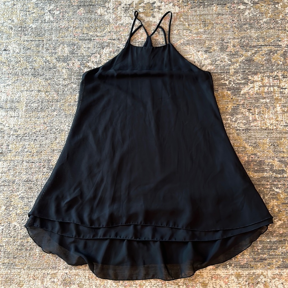 Lightweight lined slip dress. Multi layered high low ruffle trim. Size M.